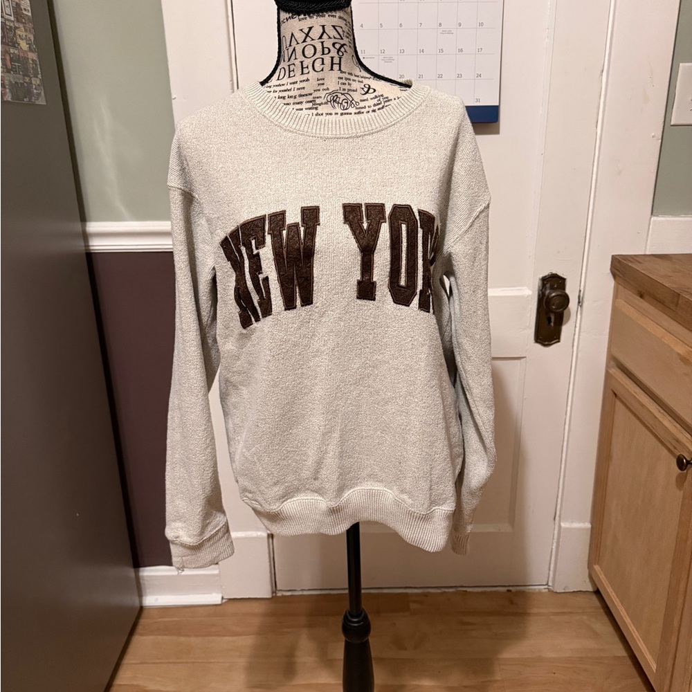 New York Popular Cozy Cream Sweater with Brown New York Lettering